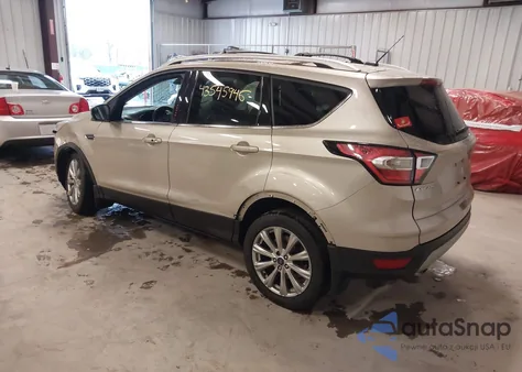 2017 Ford Escape Titanium z USA, uszkodzony, nr VIN 1FMCU9J98HUD02977